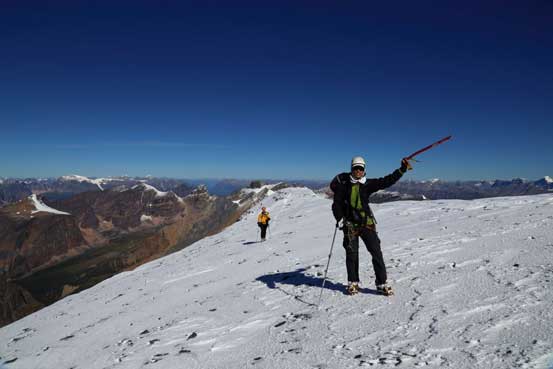 Me arriving at the summit. Photo by Ben