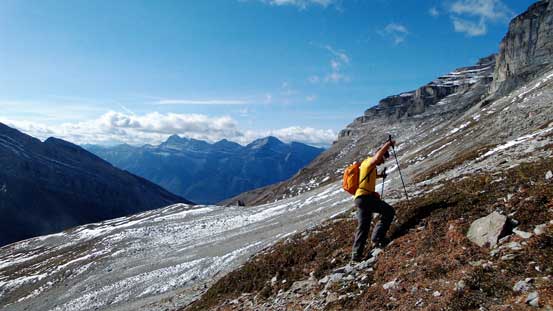 Vern ascending easy terrain. Rundle in the background