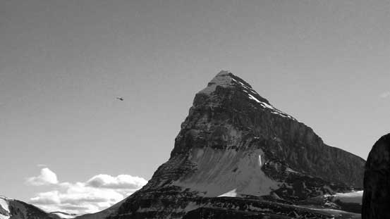 If you look closely you can see a helicopter hovering just to the left of Cline.