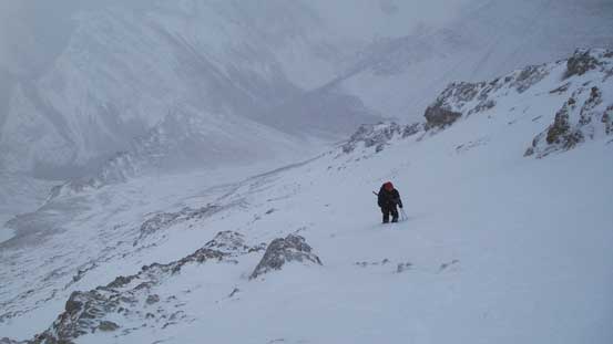Detouring to climber's right to bypass a slabby section. Knee deep post-holing here.