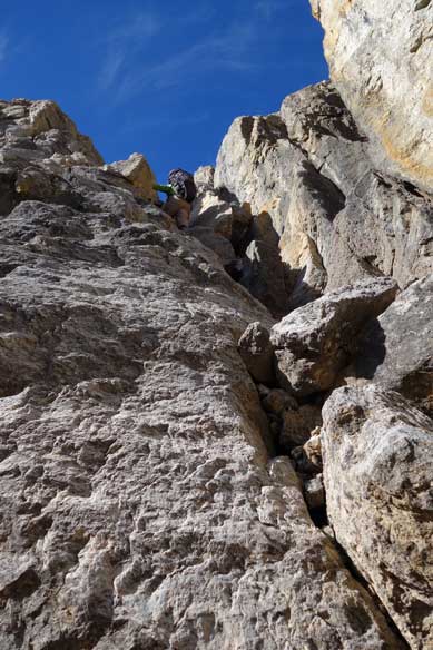Now here we go.. Me climbing up a steep chimney, again, hoping for the best.. Photo by Raff