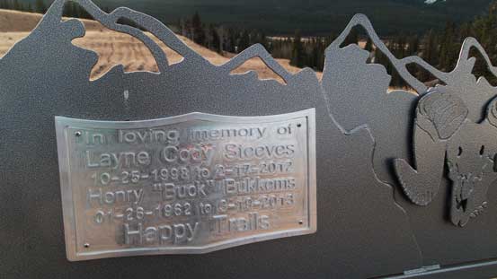 A memorial plaque on a chair. 