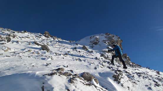 Grant ascending the typical terrain on the summit push