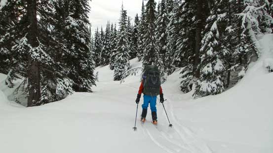Ben skiing down the tributary of Miette River