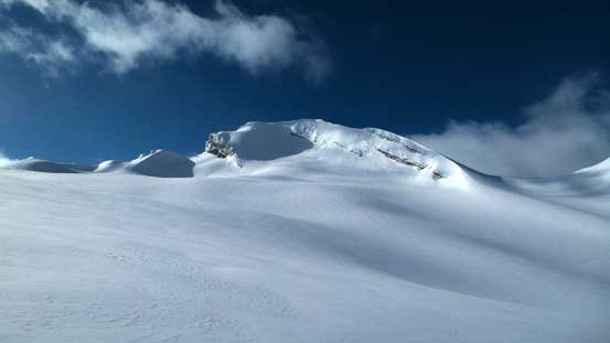Weather was definitely clearing up. This is our objective. Ascent route on the right skyline