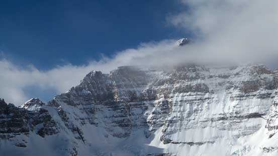 The summit of Hungabee pokes through making it look like a Himalayan giant