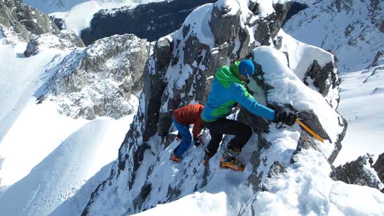 Vern and Ben down-climbing the crux