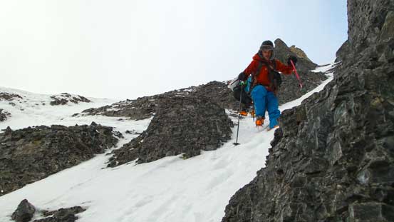 Descending the thin and steep ledges