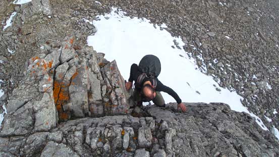 Ben down-climbing the optional crux - low 5th class for the last few moves. It's avoidable on the left side if you like this challenge.