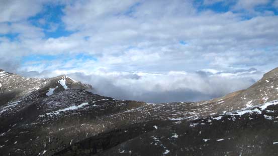 It's strange to have the prairie clouded over but not the mountains