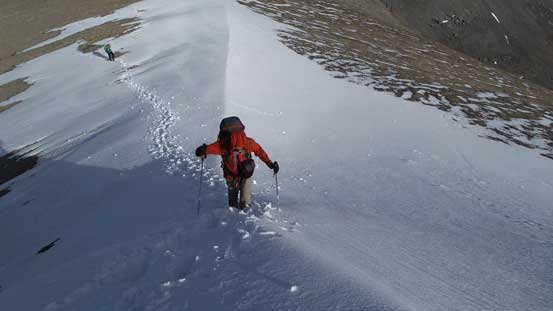 Ben re-ascending the snow arete to the 3rd false summit