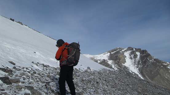 Ben just about to tackle the last snow slope before the summit ridge