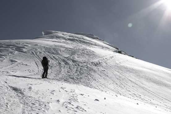 Me with the final summit push ahead. Photo by Ben