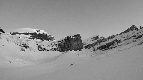 A view of the foreshortened south facing gully. Route goes right of the rock pinnacle