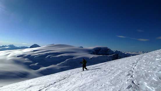 Vern arriving at the summit, with Snow Dome behind