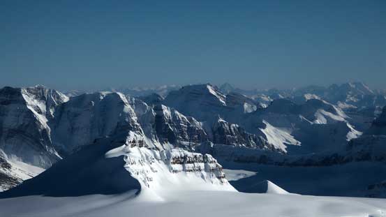 Castleguard Mountain is the tiny one in foreground. Cockscomb Mountain in center background