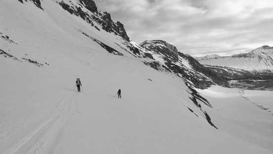 This slope is very steep and icy. We ended up having to take skis off