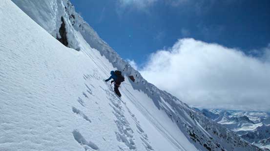 Liam and Ben carefully traversing back the crux slope