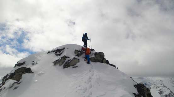 Descending a rock step near the summit
