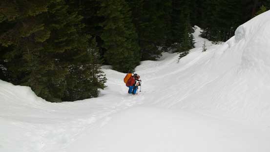 Ben trying to get up this steep slope without putting his skins back on. And he succeeded!