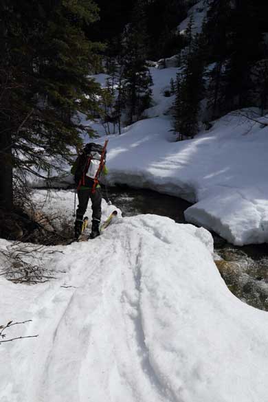 More careful maneuvering along Portal Creek. Photo by Ben