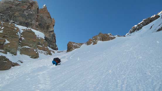 Ben strapping his snowshoes on again.