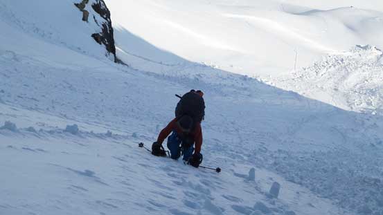 Ben climbing up steep snow