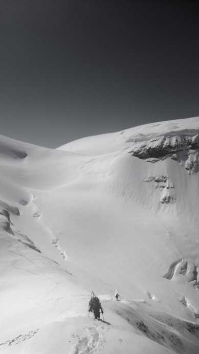 Looking back at Ben and Vern bookpacking up the narrow section