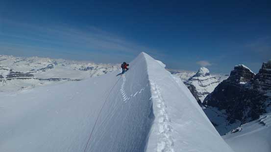 Here's a massive cornice to negotiate. Ben following my tracks, kicking in while facing inwards