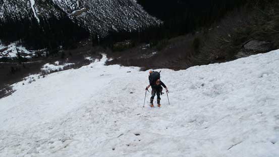 Now, ascending the obvious avalanche slide path. Ben was still trying to skin up