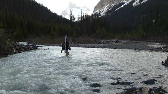 Ben crossing the river