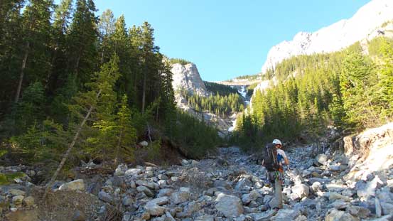 Ben ascending the side drainage.