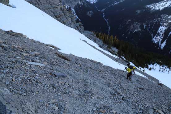 Descending steep scree. Photo by Ben