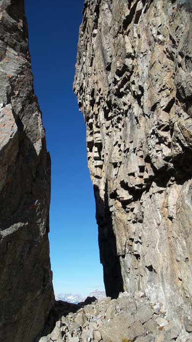 Down into the deep notch. This photo shows the slope angle on the far side of the wall