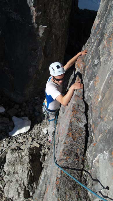 Ben climbing up the 5.6 crux pitch out of the notch. 