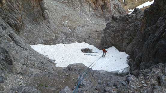 Since we had a 70-meter rope we extended the rap over this snow patch