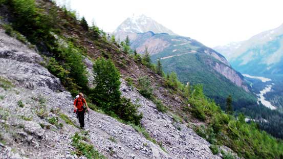Vern traversing on some down-sloping terrain at the start of that ledge