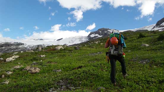Traversing easy grassy terrain - would be a prime bivy spot too.
