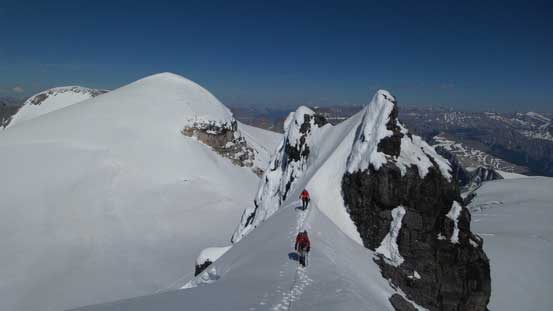 Cresting the summit ridge, looking back at Ben and Vern on a narrow section