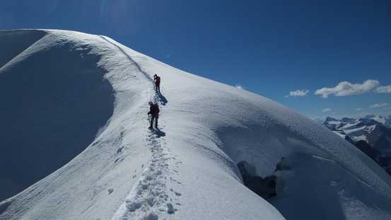 Descending the summit ridge