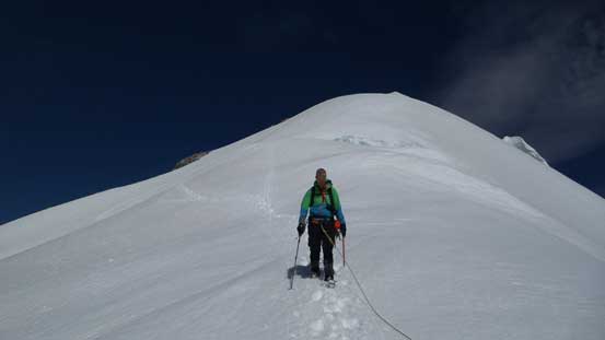 Vern walking off the south slopes of Lyell V