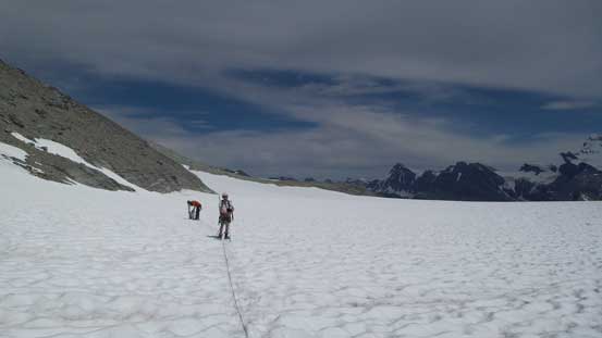 Marching back across the low snow bowl...