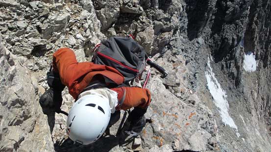 Ben down-climbing a rock step on the SE Ridge