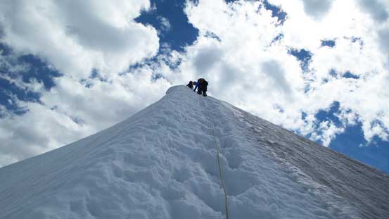 Down-climbing the snow. Note the bare glacial ice just to the right