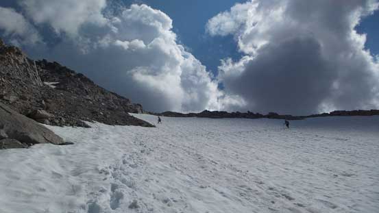 Ben and Eric descending another snow field below that glacier