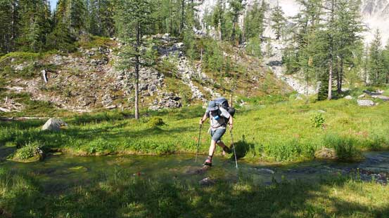Eric hopping over a stream