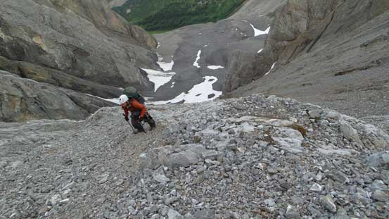 Ben slogging up scree