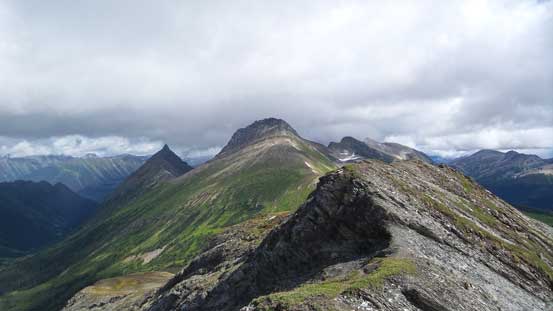 Further along the connecting ridge, our objective starts to look bigger