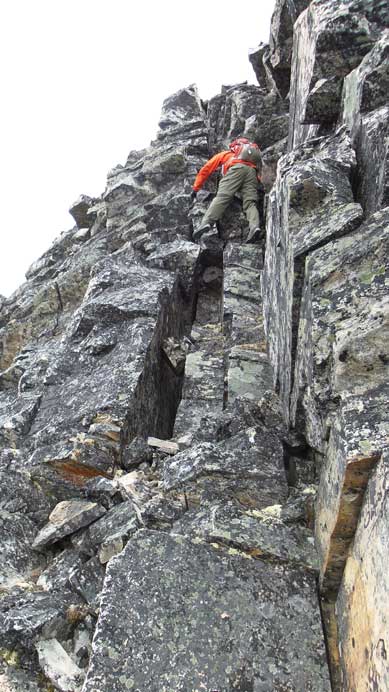 Down-climbing the summit block