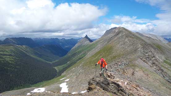 Mike traversing back along the ridge crest